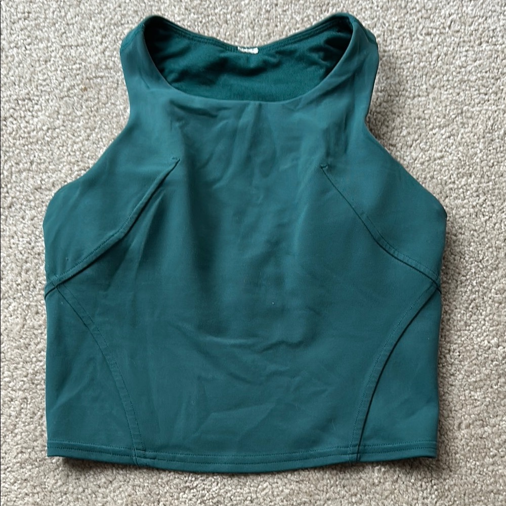 Size 2 Lululemon Wunder Train Racerback Tank with removable pads.